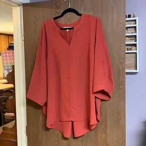 3/4 sleeve blouse with tab sleeves.